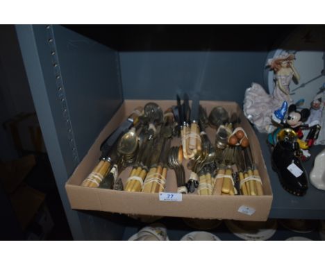 An array of mixed vintage and antique cutlery, various uses and styles.