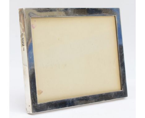 Asprey, a rectangular silver easel photograph frame, London 1912, maker and retailer marks, 20 x 14cm, replacement back