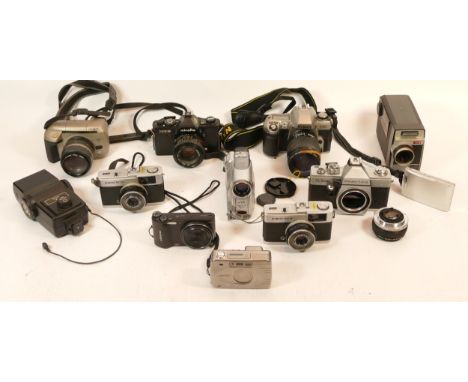 A Collection of Cameras, including Minolta XG-90, 2x Olympus Trip 35, some digital compact cameras.