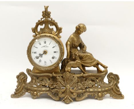 A 20th century Italian Lancini figural brass mantel clock, depicting a maiden with dog, with an eight day German movement, st