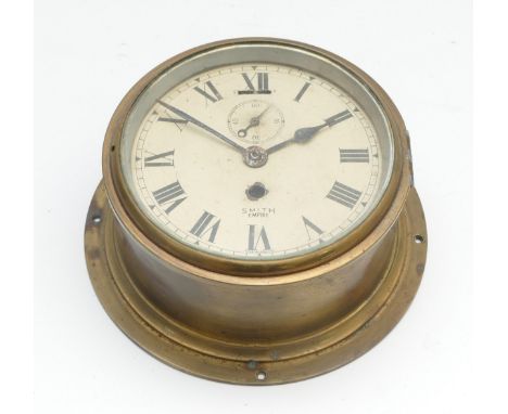 An English brass bulkhead clock, by Smiths, circa early 20th century, the painted dial with Roman numerals and subsidiary sec