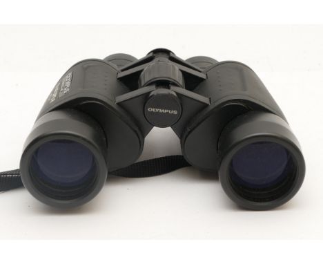 A pair of Olympus 8x40 DPS R binoculars, in makers case