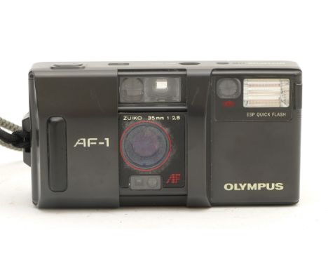An Olympus AF-1 35mm camera, with case