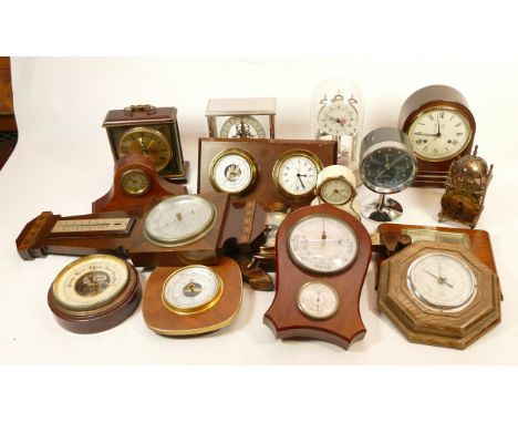 A collection of mid 20th century and later mantel clocks, carriage clocks and barometers, having manual and quartz movements.