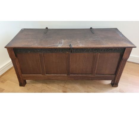 A late 19th century and later oak coffer/blanket box, of rectangular form, having panelled front with reeded supports and iro