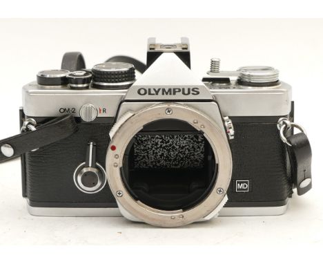 An Olympus OM-2 35mm SLR camera body