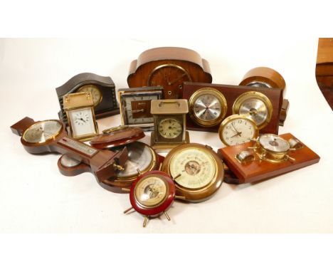 A collection of mid 20th century and later mantel clocks, carriage clocks and barometers, having manual and quartz movements,