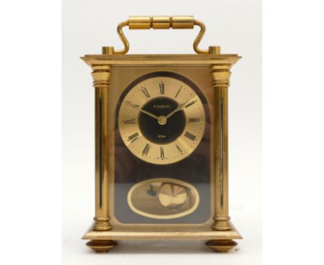A mid to late twentieth century H Samuel brass carriage clock, with a black enamel dial and an eight day movement, striking o