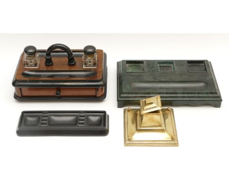 A 1930s Velos no. 1230 Bakelite desk tidy, together with a ebonised mahogany desk tidy with drawer and two inkwells, a Fibron