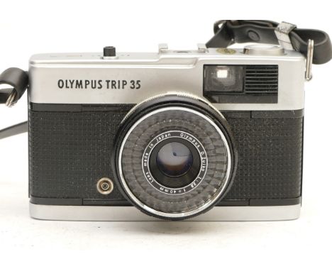 An Olympus Trip 35 camera, with wrist strap and case