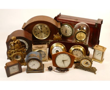 A collection of mid 20th century and later mantel, carriage and anniversary clocks, having manual and quartz movements. (3 Bo