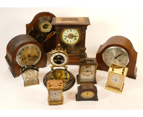A collection of mid 20th century and later mantel, carriage and wall clocks, having manual and quartz movements. (3 Boxes)