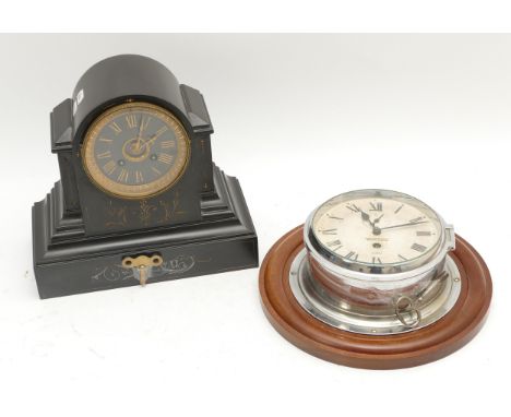 A Henry Browne and Son chrome bulkhead clock, stamped Sestrel, an enamel dial with Roman numerals and a subsidiary dial for a