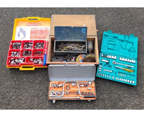 A collection tools, to include part socket sets, jubilee cup set, wooden box and contents, power tool accessories.