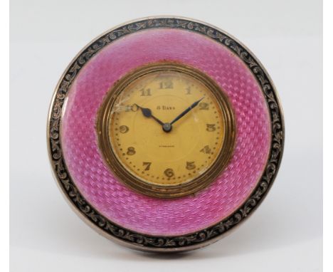 A silver and pink guilloche enamel desk timepiece, Birmingham 1924, 8cm. Enamel in good condition, clock not working, glass c
