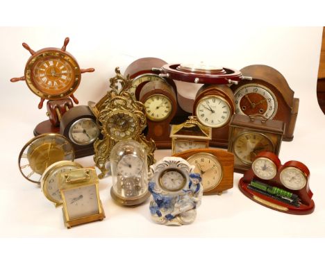 A collection of mid 20th century and later mantel, carriage and anniversary clocks, having manual and quartz movements. (3 Bo