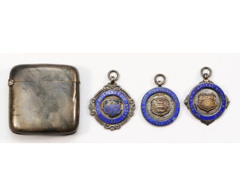 A silver vesta case, Birmingham 1895, and three silver and enamel Hull/Beverley football medals, c. 1928, 67gm