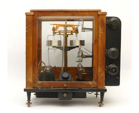 A set of Stanton analytical balance scales, model B.A.6 in glazed wooden case with a twin-pan design and weight loading hooks