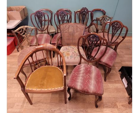 A set of five Edwardian mahogany dining chairs, together with two sets of three mahogany dining chairs, an inlaid mahogany co