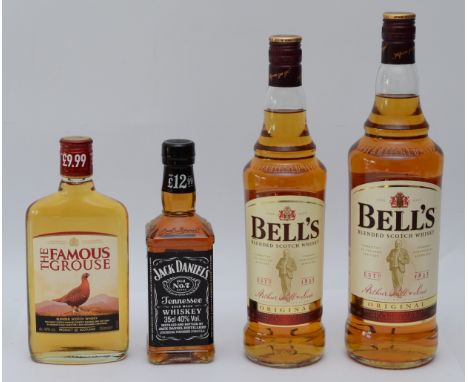 Four unopened bottles of spirit, to include, Jack Daniels, The Famous Grouse, and two examples of Bells Scotch. (4 items)