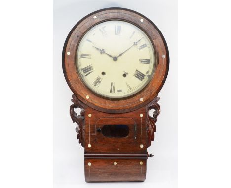 A mahogany veneer wall clock, with an enamelled dial depicting Roman numerals, an eight day movement and striking on bell, de