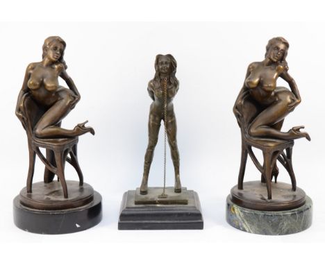 Three 20th Century bronze figurines of nude women, on green marble bases, two are identical and have the name Beach on their 