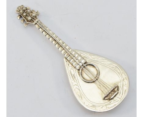 An unmarked silver novelty mandolin with locket back9cm, 25gm