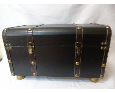 Leather effect bound trunk