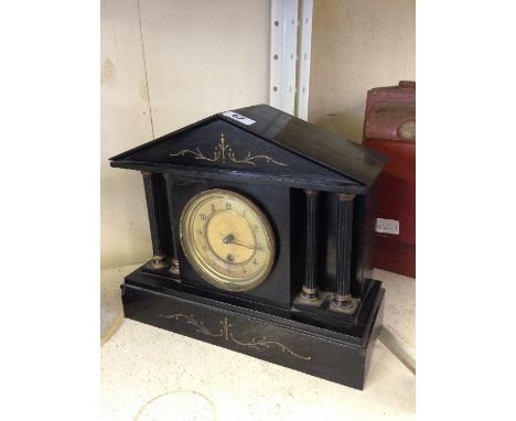 A late 19th century slate cased architectural mantle clock.