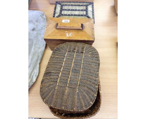 A straw basket together with a porcupine quill Anglo Indian box and a tea caddy.