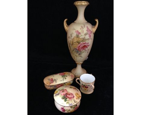 An early 20th century Royal Worcester porcelain blush ivory twin handled urn shaped vase, decorated with flowers to front and