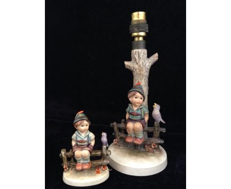 A Goebel china M. J. Hummel lamp base (224/1) together with a small Hummel figure: Wayside Harmony.
(R34)