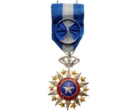 ORDER OF THE NICHAN EL ANOUAR  Officer’s Cross, instituted in 1887. Breast Badge, 67x45 mm, Silver partially gilt with diamon