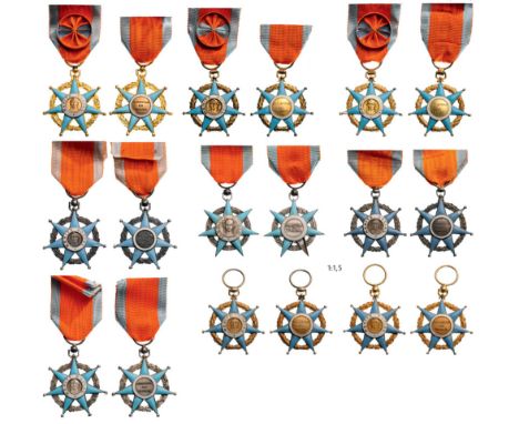 Lot of 9 ORDER OF SOCIAL MERIT Officer’s Crosses (5), Knight’s Crosses (4), instituted in 1936. Breast Badges, gilt Silver, S