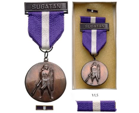 Wounded Personnel Medal Breast Badge, 38 mm, bronze, original suspension ring and ribbon with clasp "SUGATAN", in original bo