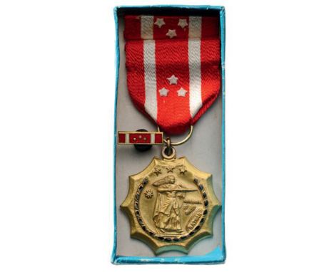 Kagitingan SA Barabgay Award Breast Badge, gilt bronze, 38 mm, partially enameled, original suspension ring and ribbon, in ca