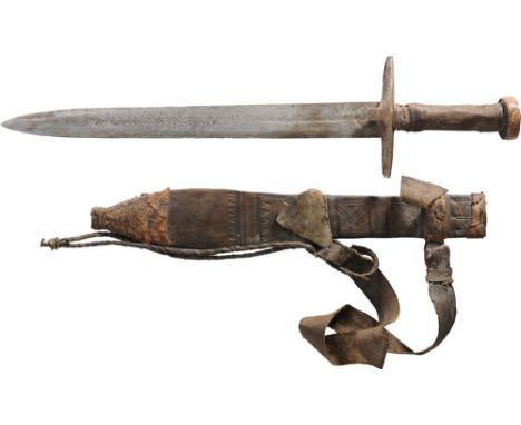 Kaskara dagger and hanger, early 20th Century Tribe Beni Amer. Steel blade and guard, wood grip covered in snake leather, woo