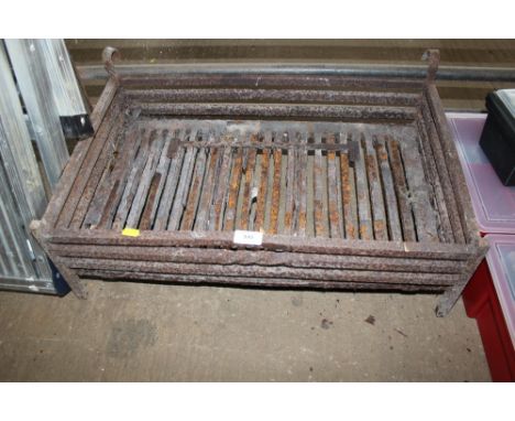 A cast iron fire grate