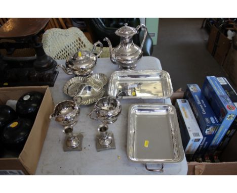 A quantity of silver plated items to include teaware; hor d'oeuvres dish; candle stick etc