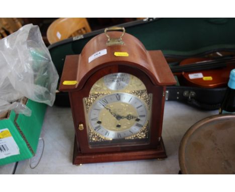 A Woodford three hole mantel clock 