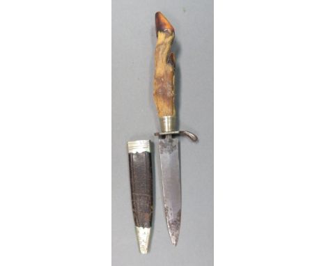 A SMALL HUNTING DAGGER, 19TH CENTURY  with tapering single-edged blade, iron cross-piece (losses) with drooping quillon, whit