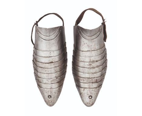 A PAIR OF SABATONS IN THE GERMAN |GOTHIC| STYLE OF THE LATE 15TH CENTURY, LATE 19TH/EARLY 20TH CENTURY each consisting of ele