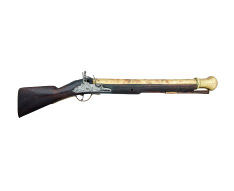 A DOG-LOCK MUSKETOON BY I. BRAZIER, CIRCA 1740 with heavy brass barrel formed in four stages, belled towards the muzzle and f
