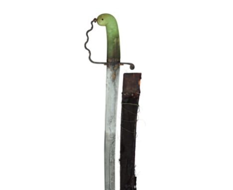 AN INDIAN SWORD (SHAMSHIR) WITH GREEN HARDSTONE HILT, MID-19TH CENTURY with curved single-edged blade formed with a brief sle