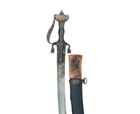 A NORTH INDIAN SWORD (TALWAR), 18TH CENTURY with curved single-edged blade of finely watered steel, retaining traces of two g