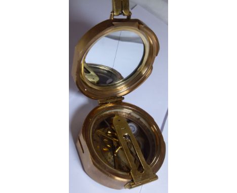 NAUTICAL COMPASS. Heavy leather cased nautical compass