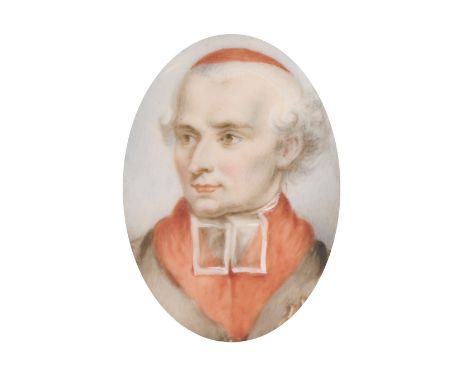 An oval portrait of a Priest in a gilt frame, 1.5" x 1.25".