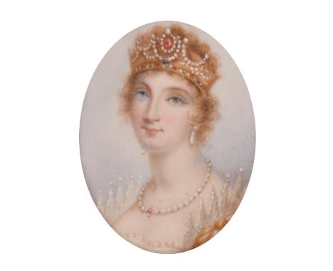 An oval portrait of a Young Lady in a silver and diamond frame, 1.75" x 1.25".