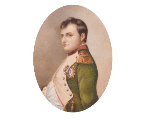 An oval portrait of Napoleon in a gilt metal frame, 3.25" x 2.5".