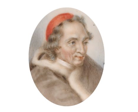 An oval portrait of a Man in a gilt frame, 1.75" x 1.25".